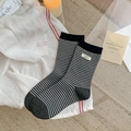Dark grey and white striped cotton crew socks with minimalist 'egg' woven label detail - Dark Gray