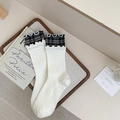 Calze di cotone bianco crema con bordo a balze a quadretti grigi e texture a coste - Bianco