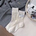 Speckled cream crew socks with light blue lace bow and cute button detail - One Size / White