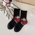 Black cotton socks with red rabbit pattern and cute ruffled cuffs in lifestyle setting - One Size / Cartoon Rabbit Pattern / Black