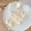 Hellgelbe Baumwollsocken mit rosa Streifen und Welpen-Label am gerippten Bund - Hellgelb