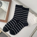 Women's crew socks with black and white stripes in a ribbed knit cotton texture - One Size / Striped Black