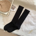 Women's black ribbed knit calf socks in a minimalist Japanese casual style - One Size / Black