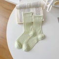 Chaussettes légères vert pastel en maille filet avec texture côtelée et losanges - vert clair