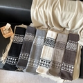 Detail view of Fair Isle knit leg warmers in six neutral colors with ribbed cuffs - One Size / Mixed Colors