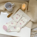 Plush white fuzzy socks with pink heart and embroidery in cozy home setting - One Size / 3D Bunny