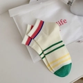 Calze di cotone bianco sporco con strisce colorate e punta verde a contrasto - verde scuro