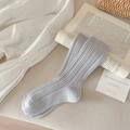 Light blue crew socks with vertical ribbed texture on a white aesthetic background - One Size / Light Gray