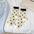 Chaussettes crème en tricot à pois bleu marine avec revers côtelés noirs - Taille unique / Jaune