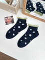 Navy blue polka dot cotton socks with light green rolled cuffs in a minimalist style - One Size / Dark Blue (Black)