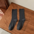 Classic ribbed dark grey cotton crew socks for women on a rustic vintage wooden surface - Dark Gray