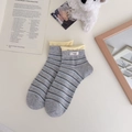 Calcetines grises de algodón peinado con rayas azules y etiqueta mínima de tela Egg - Talla única / Gris claro