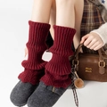 Knitted leg warmers in wine red color featuring vertical stripes for winter comfort - One Size / Burgundy