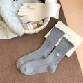 Dark gray wool socks with heart bow embroidery and cream knit gloves for winter warmth - One Size / Light Gray