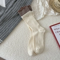 Striped knit crew socks in beige and brown with button detail and ribbed texture - Off-white