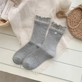 Gray mid-calf socks with plaid ruffle lace trim and decorative flower button detail - One Size / Light Gray