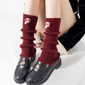 Jambières en tricot rouge à nœuds avec mocassins noirs à boucle rose sur socle blanc - Taille unique / Nœud à Poche