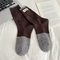 Retro dark brown and grey wool socks with distressed knit texture and white cloth label - One Size / Dark Coffee
