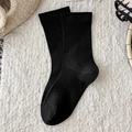 Calze nere classiche da donna in morbido cotone lavorato a maglia per un look minimalista - Taglia unica / Nero