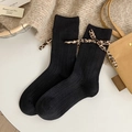 Schwarze Socken mit Rippstrickmuster und dekorativer Schleife im Leoparden-Look - Einheitsgröße / Schwarz