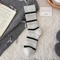 Thick wool socks for women with black and grey stripes on a creamy melange base - White Striped