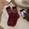 Dark red wool socks with white heart and pine tree patterns on a cozy knit background - One Size / Heart