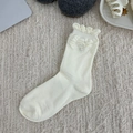 Creamy white crew socks with ruffled cuffs and pearl accents in vintage knit style - Three Pearls Style