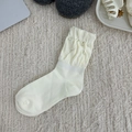 Beige bubble lace mid-tube sock with ruffle edges and delicate pearl bead accents - Multiple Pearls Style