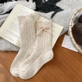 Warme haferflockenfarbene Wollsocken mit Schleife und gewelltem Bündchen - Einheitsgröße / Beige