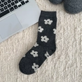 Dark grey Fair Isle wool socks featuring white daisy embroidery and thick knit texture - One Size / Flower