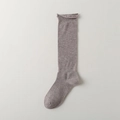 Japanese style taupe wool slouch socks with loose rolled edges for a minimalist look - Khaki