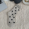 Calze in lana stile Fair Isle con pois neri e design casual con bordo arrotolato - Grandi Pois
