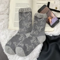 Grey wool socks featuring white bear patterns with rib-knit cuffs for winter warmth - One Size / Light Gray