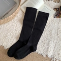 Knee-high black ribbed cotton socks with minimalist texture for autumn and winter outfits - One Size / Black
