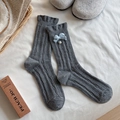 Grey wool-blend mid-tube socks with cable knit, blue bow, and pearl accent for women - One Size / Dark Gray