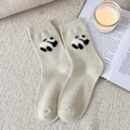 Beige wool socks with cute panda pattern on a cozy knit blanket background - One Size / Off-white