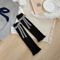 Calentadores de punto negro con lazo de piel sintética gris para un estilo de invierno - Talla única / Negro