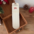 Beige crew socks with red polka dot bow and hollow knit texture in holiday basket - One Size / Bow