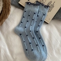 Light blue crew socks with dark blue frilly edges and stylish polka dot pattern - One Size / Blue