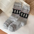 Thick knit mid-calf socks in grey featuring black pine tree patterns and red heart dots - One Size / Light Gray