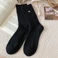 Women's black ribbed wool crew socks with decorative silver button and thick texture - One Size / Black