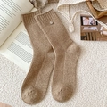 Dark khaki ribbed wool blend socks featuring a decorative silver button on the cuff - One Size / Khaki