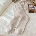 Chic cream-white ribbed wool socks featuring a minimalist metallic pendant accent - One Size / Beige