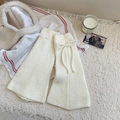 Creamy white knitted leg warmers with bow drawstrings and matching hat in soft knit - One Size / White