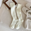 Cream knit knee-high socks featuring classic diamond lattice and ribbed patterns - One Size / White
