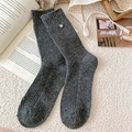 Dark grey ribbed wool socks with silver metal button detail on plush background - One Size / Dark Gray