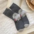Calze grigie lavorate a maglia con simpatico cane bianco cartone animato e fiocco rosa - Taglia unica / grigio scuro
