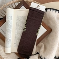 Dark brown wool crew socks featuring green frilly edges and retro aesthetic textures - One Size / Dark Coffee
