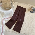 Deep brown ribbed knit leg warmers with vintage buttons on a soft textured rug - One Size / Coffee
