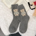 Gray mid-calf wool socks featuring a cute beige cartoon bear pattern with snowflake motifs - Gray